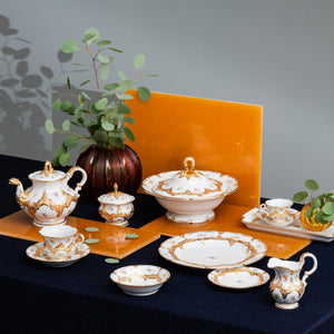 Dessertschale "B-Form Goldbronze", gestreute Blümchen
